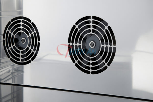 Cánh quạt tản nhiệt lò nướng đối lưu công nghiệp sạch sẽ, bề mặt inox bóng loáng sau khi được vệ sinh định kỳ.